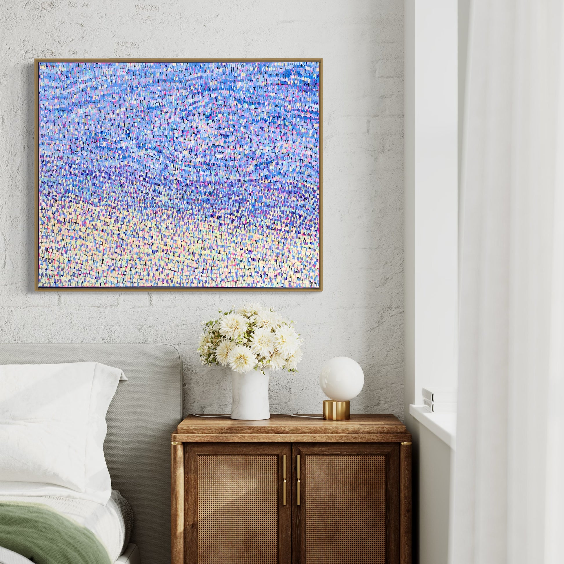 Colourful abstract artwork hanging on wall above bed by Anouska Healy